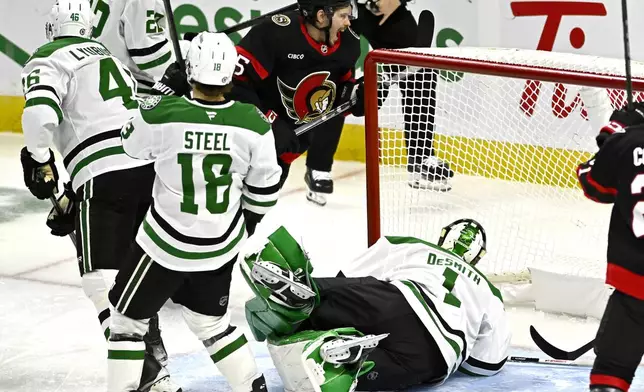 Ottawa Senators' Matthew Highmore (15) celebrates after his goal against Dallas Stars goaltender Casey DeSmith (1) during third-period NHL hockey game action in Ottawa, Ontario, Sunday, Jan. 12, 2025. (Justin Tang/The Canadian Press via AP)