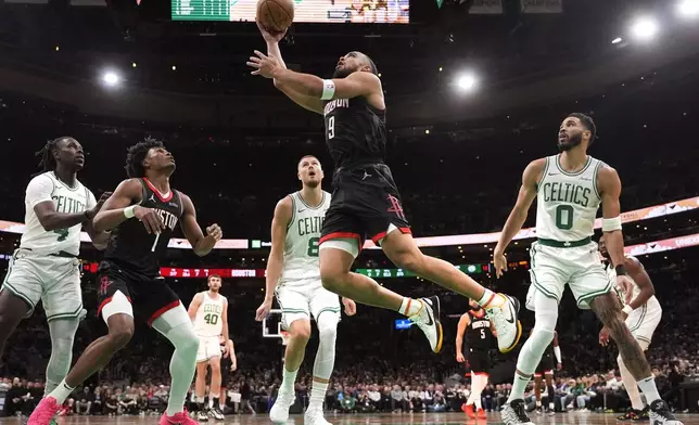 Houston Rockets forward Dillon Brooks (9) drives to the basket against the Boston Celtics during the first half of an NBA basketball game, Monday, Jan. 27, 2025, in Boston. (AP Photo/Charles Krupa)