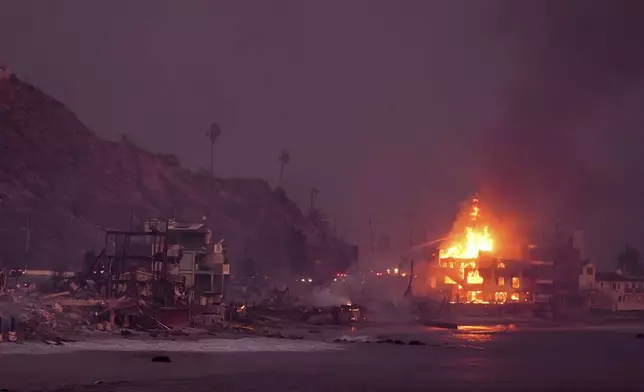 Beach front homes are destroyed by the Palisades Fire Wednesday, Jan. 8, 2025 in Malibu, Calif. (AP Photo/Mark J. Terrill)