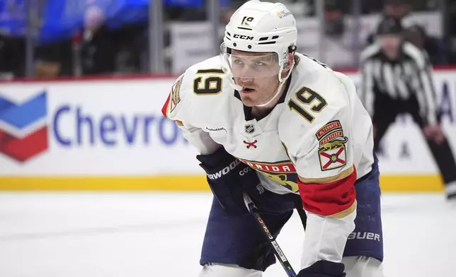 Florida Panthers left wing Matthew Tkachuk waits for a face off in the second period of an NHL hockey game against the Colorado Avalanche, Monday, Jan. 6, 2025, in Denver. (AP Photo/David Zalubowski)