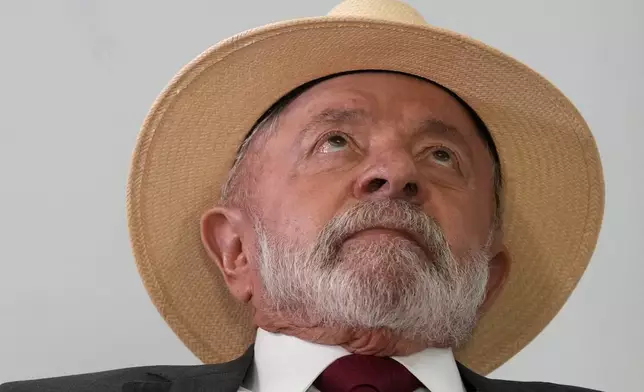 Brazilian President Luiz Inacio Lula da Silva attends a ceremony marking two years since the alleged coup attempt when supporters of former President Jair Bolsonaro invaded government buildings and called for a military intervention in Brasilia, Brazil, Wednesday, Jan. 8, 2025. (AP Photo/Eraldo Peres)