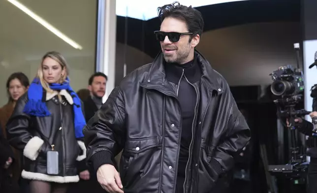 Sebastian Stan arrives as he attends at the men's Prada Fall-Winter 2025-2026 collection show, that was presented in Milan, Italy, Sunday, Jan. 19, 2025. (AP Photo/Antonio Calanni)