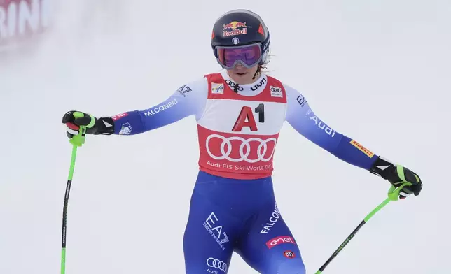 Italy's Sofia Goggia reacts after going out in an alpine ski, women's World Cup super G race, in St. Anton, Austria, Sunday, Jan. 12, 2025. (AP Photo/Giovanni Auletta)
