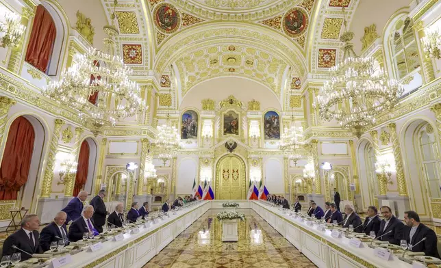 A view of the Russia and Iran talks in an expanded format at the Kremlin in Moscow, Russia, Friday, Jan. 17, 2025. (Vyacheslav Prokofyev, Sputnik, Kremlin Pool Photo via AP)