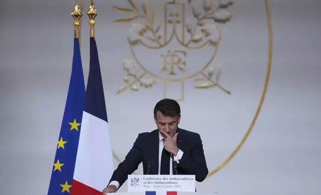 French President Emmanuel Macron delivers his speech to French ambassadors posted around the world, Monday, Jan. 6, 2025 at the Elysee Palace in Paris. (AP Photo/Aurelien Morissard, Pool)