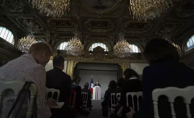 French President Emmanuel Macron delivers his speech to French ambassadors posted around the world, Monday, Jan. 6, 2025 at the Elysee Palace in Paris. (AP Photo/Aurelien Morissard, Pool)