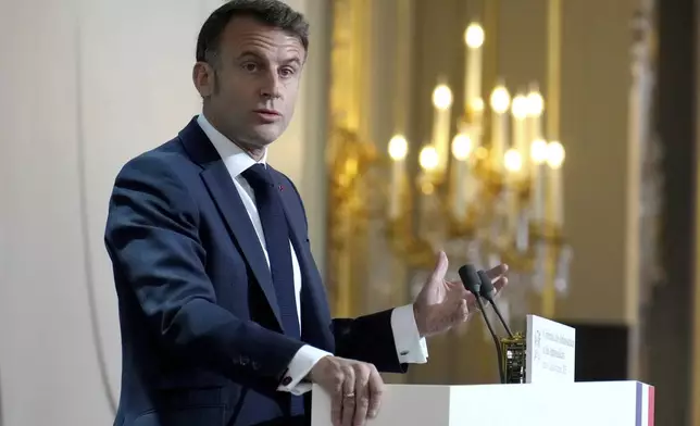 French President Emmanuel Macron delivers his speech to French ambassadors posted around the world, Monday, Jan. 6, 2025 at the Elysee Palace in Paris. (AP Photo/Aurelien Morissard, Pool)