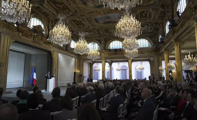 French President Emmanuel Macron delivers his speech to French ambassadors posted around the world, Monday, Jan. 6, 2025 at the Elysee Palace in Paris. (AP Photo/Aurelien Morissard, Pool)