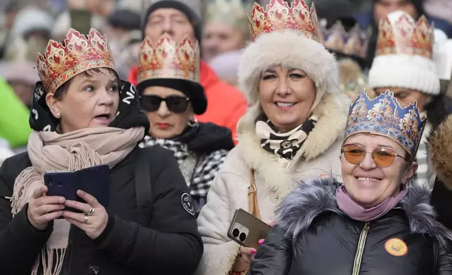 People attend the annual Epiphany procession in Warsaw, Poland, Monday, Jan. 6, 2025. (AP Photo/Czarek Sokolowski)