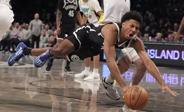 Brooklyn Nets' Reece Beekman (4) loses controlf of the ball during the first half of an NBA basketball game against the Indiana Pacers, Monday, Jan. 6, 2025, in New York. (AP Photo/Frank Franklin II)