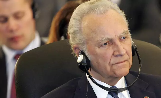 FILE - Estonian President Arnold Ruutel listens to a speech during the Vilnius Conference 2006 in Vilnius, Lithuania Thursday May 4, 2006. (AP Photo/Mindaugas Kulbis, File)