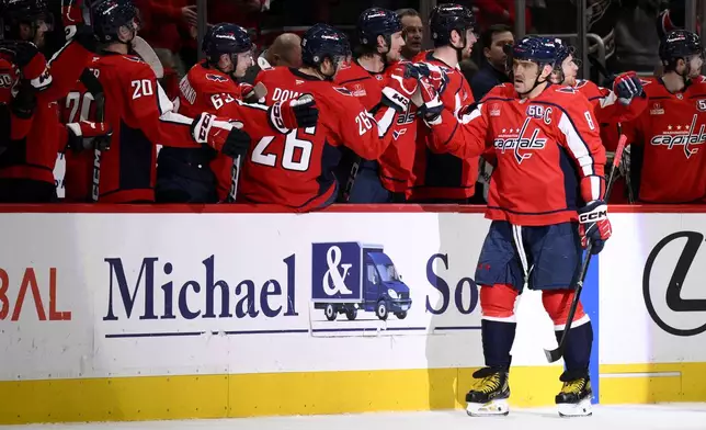 Washington Capitals left wing Alex Ovechkin (8) celebrates his goal during the second period of an NHL hockey game against the Minnesota Wild, Thursday, Jan. 2, 2025, in Washington. (AP Photo/Nick Wass)