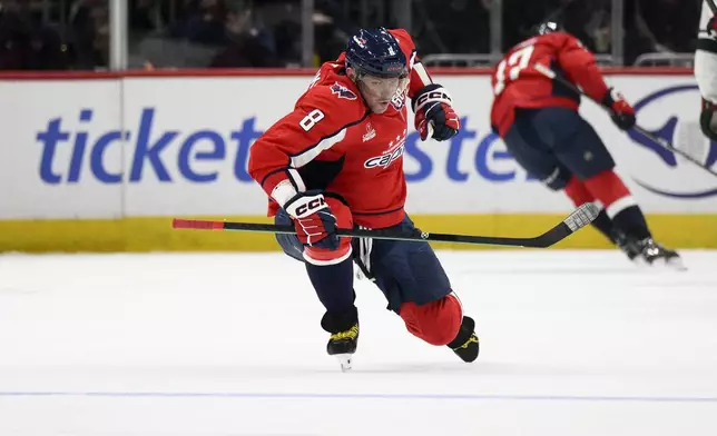 Washington Capitals left wing Alex Ovechkin (8) celebrates his goal during the second period of an NHL hockey game against the Minnesota Wild, Thursday, Jan. 2, 2025, in Washington. (AP Photo/Nick Wass)