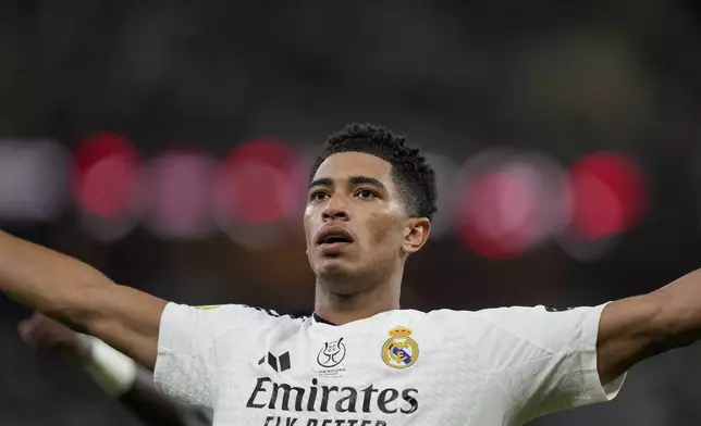 Real Madrid's Jude Bellingham celebrates after scoring his side's opening goal during the Spanish Super Cup semifinal soccer match between Real Madrid and Mallorca at the King Abdullah Stadium in Jeddah, Saudi Arabia, Thursday, Jan. 9, 2025. (AP Photo/Altaf Qadri)