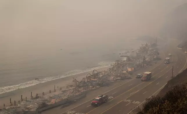 Beach front properties are burned to the ground by the Palisades Fire Thursday, Jan. 9, 2025 in Malibu, Calif. (AP Photo/Jae C. Hong)