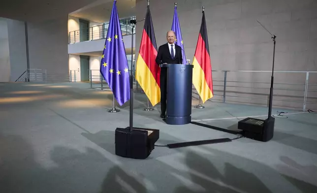 German Chancellor Olaf Scholz gives a statement at the chancellery in Berlin, Germany, Wednesday, Jan. 8, 2025. (AP Photo/Markus Schreiber)