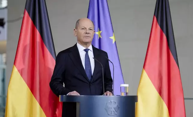 German Chancellor Olaf Scholz gives a statement at the chancellery in Berlin, Germany, Wednesday, Jan. 8, 2025. (AP Photo/Markus Schreiber)