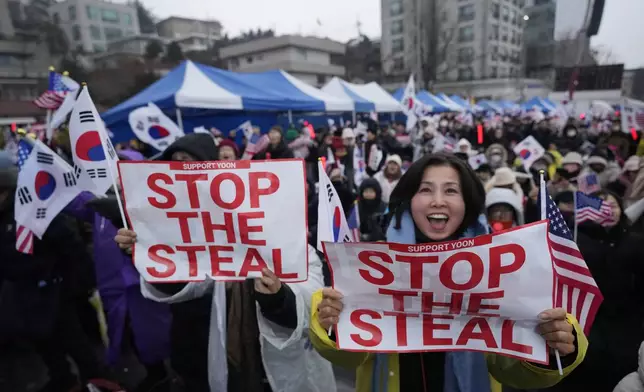 Supporters of impeached South Korean President Yoon Suk Yeol attend a rally to oppose his impeachment near the presidential residence in Seoul, South Korea, Monday, Jan. 6, 2025. (AP Photo/Ahn Young-joon)