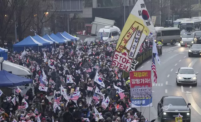 Supporters of impeached South Korean President Yoon Suk Yeol stage a rally to oppose his impeachment near the presidential residence in Seoul, South Korea, Monday, Jan. 6, 2025. (AP Photo/Ahn Young-joon)