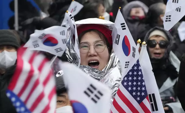 A supporter of impeached South Korean President Yoon Suk Yeol shouts slogans during a rally to oppose his impeachment near the presidential residence in Seoul, South Korea, Monday, Jan. 6, 2025. (AP Photo/Ahn Young-joon)