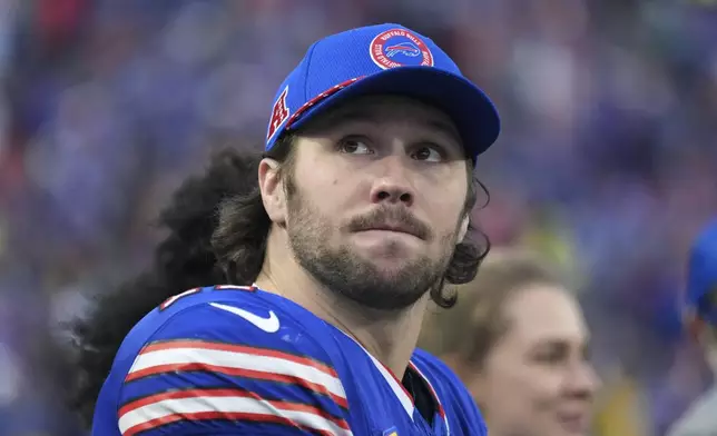 Buffalo Bills quarterback Josh Allen (17) stands on the sidelines during the second half of an NFL football game against the New York Jets, Sunday, Dec. 29, 2024, in Orchard Park, N.Y. (AP Photo/Gene J. Puskar)