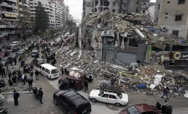 FILE - Displaced residents return to Dahiyeh, in Beirut, Lebanon, following a ceasefire between Israel and Hezbollah on Nov. 27, 2024. (AP Photo/Bilal Hussein, File)