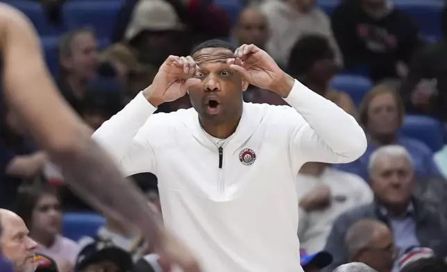 New Orleans Pelicans head coach Willie Green calls out from the bench in the first half of an NBA basketball game against the Minnesota Timberwolves in New Orleans, Tuesday, Jan. 7, 2025. (AP Photo/Gerald Herbert)