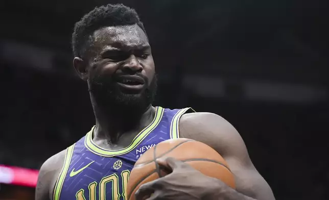 New Orleans Pelicans forward Zion Williamson reacts to an official's call in the first half of an NBA basketball game against the Minnesota Timberwolves in New Orleans, Tuesday, Jan. 7, 2025. (AP Photo/Gerald Herbert)