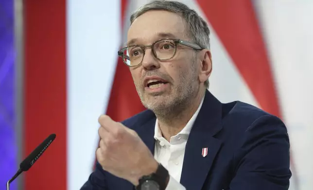 The leader of Austria's Freedom Party, Herbert Kickl, addresses a news conference, in Vienna, Austria, Tuesday, Jan 7, 2025. Herbert Kickl received a mandate Monday to try to form a new government. (AP Photo/Heinz-Peter Bader)