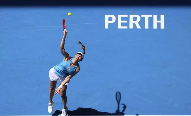 Elena Rybakina of Kazakhstan serves to Laura Siegemund of Germany during their United Cup tennis match in Perth, Australia, Wednesday, Jan. 1, 2025. (AP Photo/Trevor Collens)