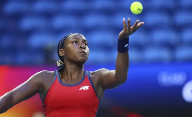 Coco Gauff of the United States serves to Shuai Zhang of China during their United Cup tennis match in Perth, Australia, Wednesday, Jan. 1, 2025. (AP Photo/Trevor Collens)