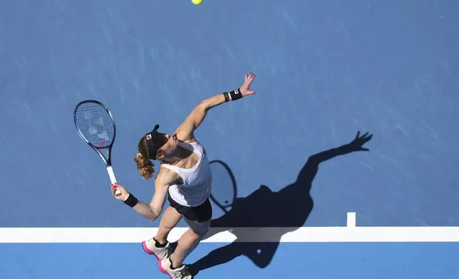 Laura Siegemund of Germany serves to Elena Rybakina of Kazakhstan during their United Cup tennis match in Perth, Australia, Wednesday, Jan. 1, 2025. (AP Photo/Trevor Collens)