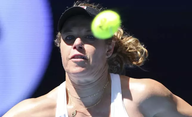 Laura Siegemund of Germany hits a return shot to Elena Rybakina of Kazakhstan during their United Cup tennis match in Perth, Australia, Wednesday, Jan. 1, 2025. (AP Photo/Trevor Collens)