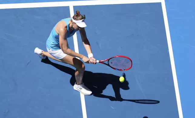 Elena Rybakina of Kazakhstan hits a return shot to Laura Siegemund of Germany during their United Cup tennis match in Perth, Australia, Wednesday, Jan. 1, 2025. (AP Photo/Trevor Collens)