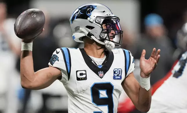 Carolina Panthers quarterback Bryce Young passes against the Atlanta Falcons during the second half of an NFL football game, Sunday, Jan. 5, 2025, in Atlanta. (AP Photo/Mike Stewart)