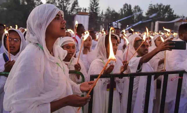 Ethiopian pilgrims pray during a Mass service for Ethiopian Christmas at the Bole Medhane Alem cathedral in Addis Ababa, Ethiopia, Monday, Jan. 6, 2025. (AP Photo)