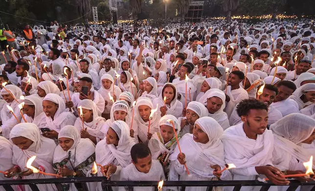 Ethiopian pilgrims pray during a Mass service for Ethiopian Christmas at the Bole Medhane Alem cathedral in Addis Ababa, Ethiopia, Monday, Jan. 6, 2025. (AP Photo)