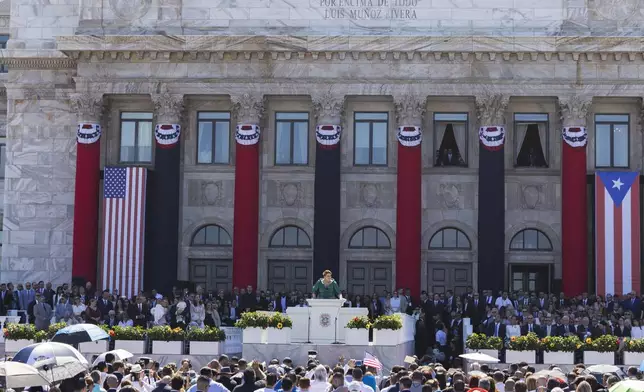 Jenniffer Gonzalez Colon speaks after she was sworn in as governor outside the Capitol in San Juan, Puerto Rico, Thursday, Jan. 2, 2025. (AP Photo/Alejandro Granadillo)