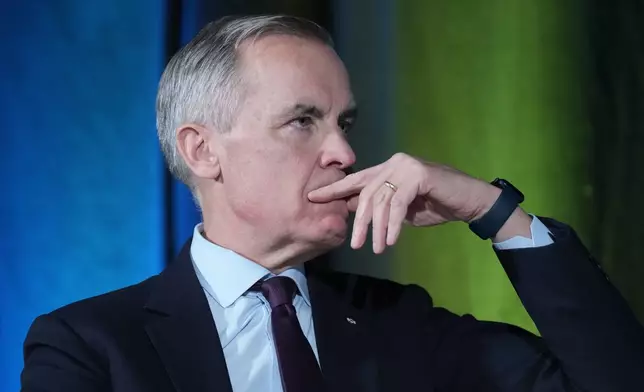 FILE - Mark Carney, who has served as the governor of the Bank of Canada and the Bank of England, speaks at the Sustainable Finance conference, Nov. 28, 2024. (Adrian Wyld/The Canadian Press via AP, File)