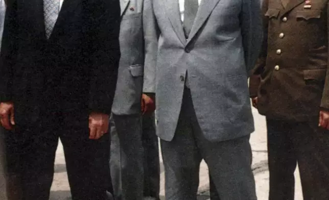 FILE - This photo provided by the North Korean government shows former U.S. President Jimmy Carter, left, and then North Korean President Kim Il Sung looking at the West Sea Barrage in Nampo, North Korea, on June 17, 1994. (Korean Central News Agency/Korea News Service via AP, File)