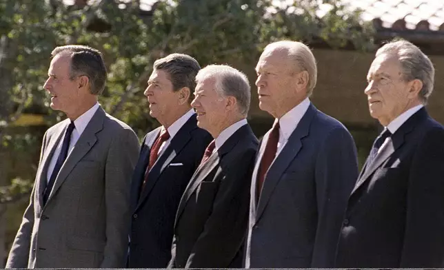 FILE - President George Bush, former President Ronald Reagan, former President Jimmy Carter, former President Gerald Ford and former President Richard Nixon attend the dedication ceremony for the Ronald Reagan Presidential Library in Simi Valley, Calif, on Nov. 5, 1991. (AP Photo/Marcy Nighswander, File)