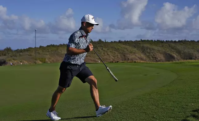 Xander Schauffele walks off the 11th green during the pro-am round of The Sentry golf event, Wednesday, Jan. 1, 2025, at Kapalua Plantation Course in Kapalua, Hawaii. (AP Photo/Matt York)