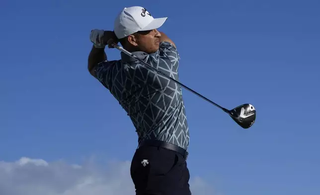 Xander Schauffele hits from the 10th tee during the pro-am round of The Sentry golf event, Wednesday, Jan. 1, 2025, at Kapalua Plantation Course in Kapalua, Hawaii. (AP Photo/Matt York)