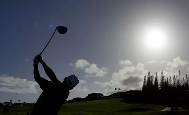 Hideki Matsuyama, of Japan, hits from the 10th tee during the pro-am round of The Sentry golf event, Wednesday, Jan. 1, 2025, at Kapalua Plantation Course in Kapalua, Hawaii. (AP Photo/Matt York)