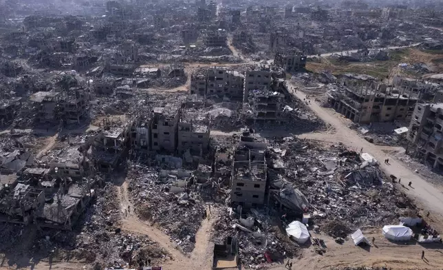 An aerial photograph taken by a drone shows the destruction caused by the Israeli air and ground offensive in Jabaliya, Gaza Strip, Wednesday, Jan. 29, 2025. (AP Photo/Mohammad Abu Samra)