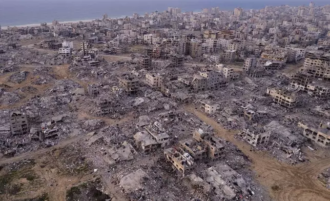 Buildings that were destroyed by the Israeli air and ground offensive are seen at the Tel al-Hawa neighbourhood in Gaza Strip, Tuesday, Jan. 28, 2025. (AP Photo/Mohamamd Abu Samra)