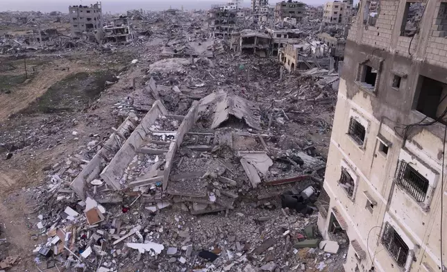 Buildings that were destroyed by the Israeli air and ground offensive are seen at the Tel al-Hawa neighbourhood in Gaza Strip, Tuesday, Jan. 28, 2025. (AP Photo/Mohamamd Abu Samra)