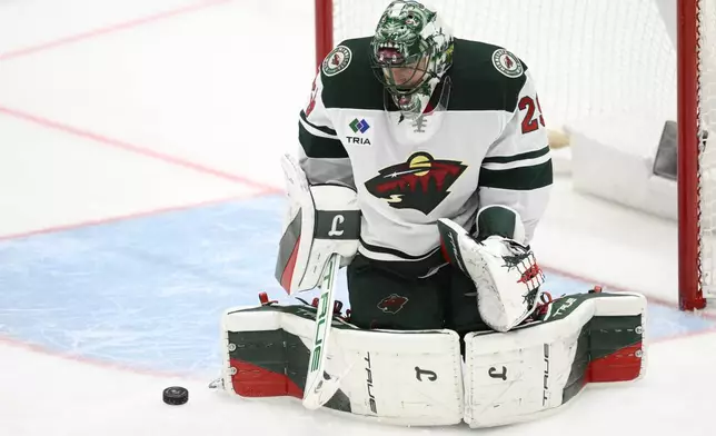 Minnesota Wild goaltender Marc-Andre Fleury (29) stops the puck during the third period of an NHL hockey game against the Washington Capitals, Thursday, Jan. 2, 2025, in Washington. The Wild won 4-3 in a shootout. (AP Photo/Nick Wass)