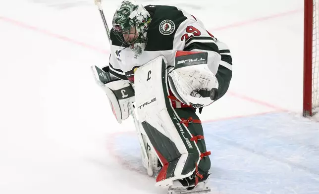 Minnesota Wild goaltender Marc-Andre Fleury (29) stops a shot by Washington Capitals left wing Alex Ovechkin during the shootout of an NHL hockey game, Thursday, Jan. 2, 2025, in Washington. The Wild won 4-3 in a shootout. (AP Photo/Nick Wass)