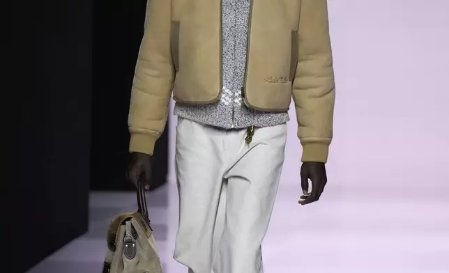 A model wears a creation as part of the men's Louis Vuitton Fall-Winter 2025-2026 collection, that was presented in Paris, Tuesday, Jan. 21, 2025. (AP Photo/Michel Euler)